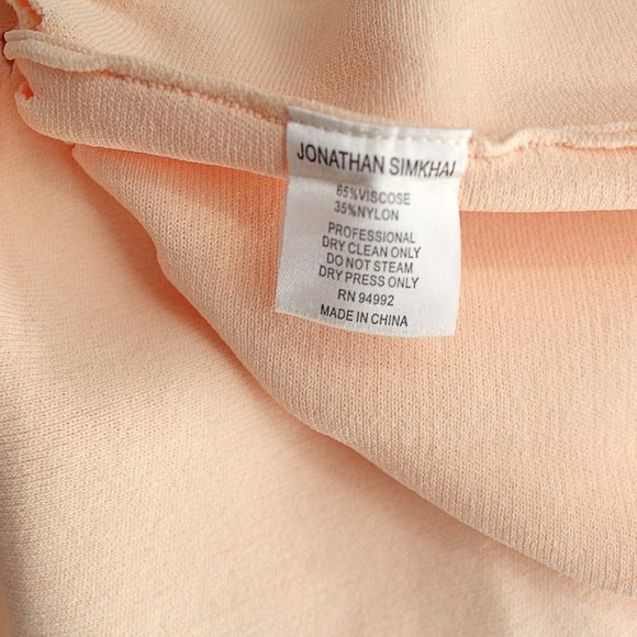 Jonathan Simkhai Stretch Knit Bell Sleeve Peplum Top Blush Cut Out  Jewel Neck - Picture 8 of 13